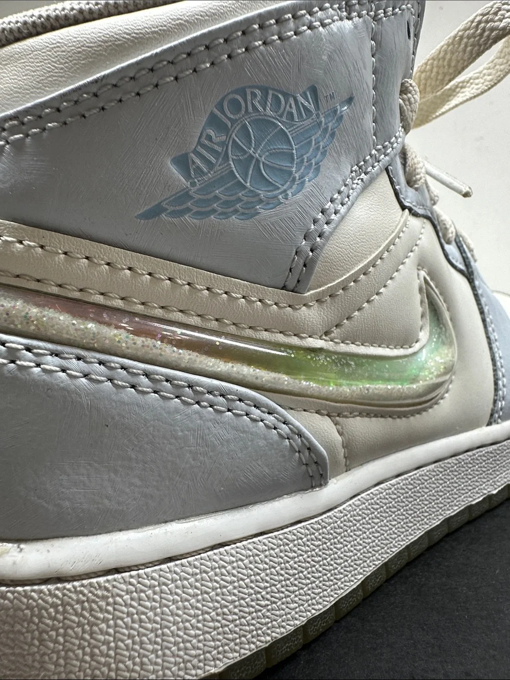 Air Jordan Kids Mid-Top Sneakers in White and Light Blue with Iridescent Swoosh